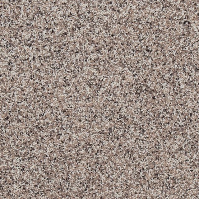 Light brown textured surface with fine grains and speckles.