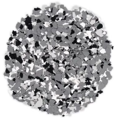 Round pattern of small, irregular black, white, and gray fragments.